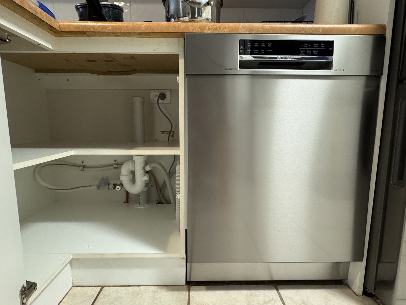 Dishwasher connected under the bench