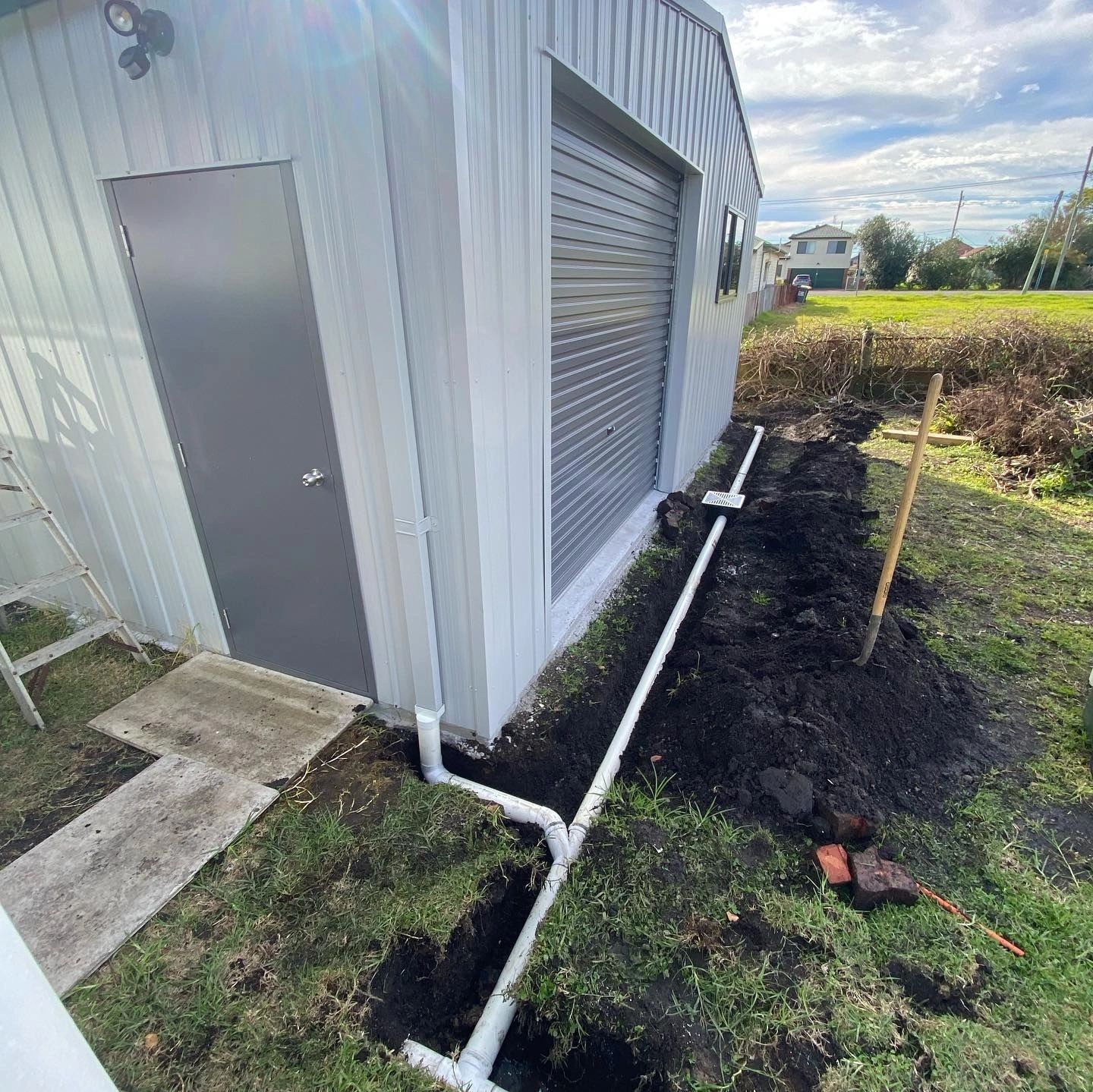Drainage run alongside a new shed